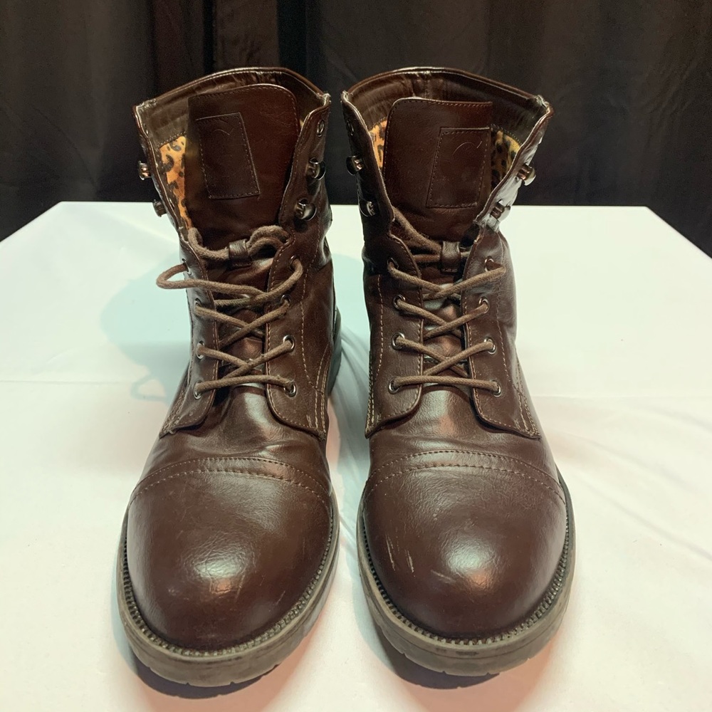 Brown combat boots.